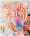 balon-cyfra-z-zerem-rose-gold-rozowe-zloto-balony-cyfry-w-ksztalcie-zera-do-napelnienia-helem-Wiewiorka-i-Spolka-zero-rose-gold-number-balloon-numbers-foil-balloons-Squirrel-Company