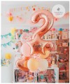 balon-cyfra-dwojka-rose-gold-rozowe-zloto-balony-cyfry-w-ksztalcie-dwojki-do-napelnienia-helem-Wiewiorka-i-Spolka-two-rose-gold-number-balloon-Squirrel-Company